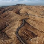 An aerial view of a winding road in Hendida mount, Fuerteventura, Canary Islands, Kanarische Insel, Spain